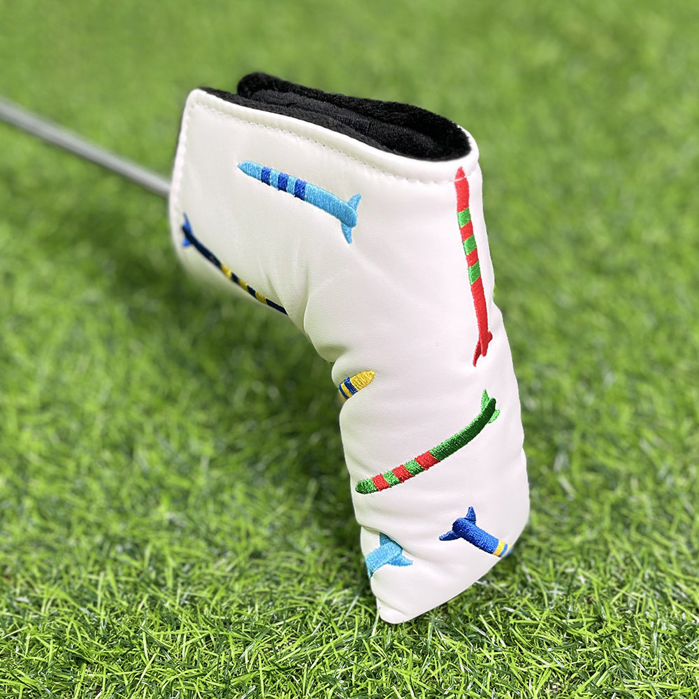 Playful rocket embroidery putter covers